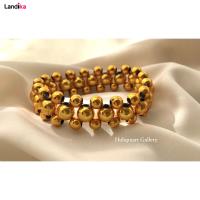 دستبند بافت با مهره ‌های طلایی